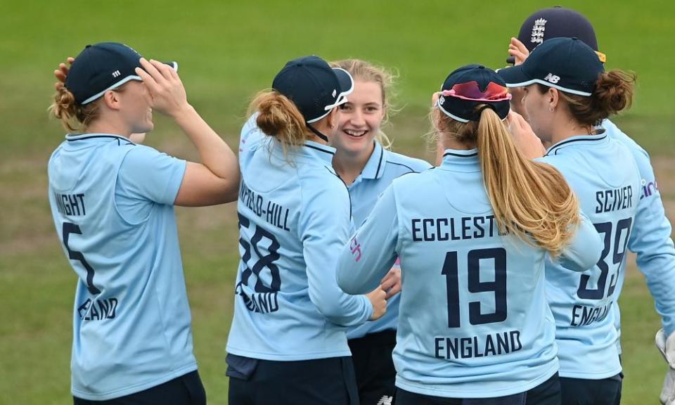 Charlie Dean is congratulated after taking the wicket of New Zealand’s Katey Martin