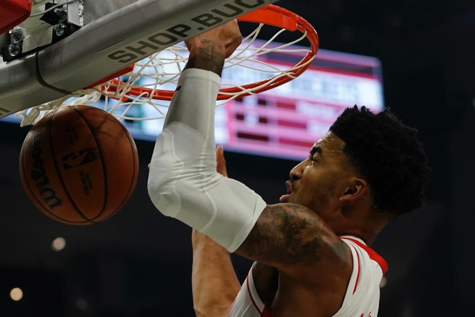 Houston Rockets' Kenyon Martin Jr. dunks during the first half of an NBA basketball game Saturday, Oct. 22, 2022, in Milwaukee. (AP Photo/Morry Gash)