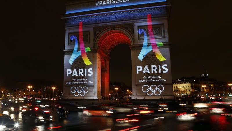 The Eiffel Tower-shaped bid logo for the Paris 2024 is unveiled on The Arc of Triomphe on the Champs Elysees in Paris, France, on Tuesday, Feb. 9, 2016.