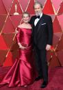 <p>What's more classic than a red gown and black tux? These two, of course!</p> <p>The pair get together in pitch-perfect style at the Oscars in 2017.</p>