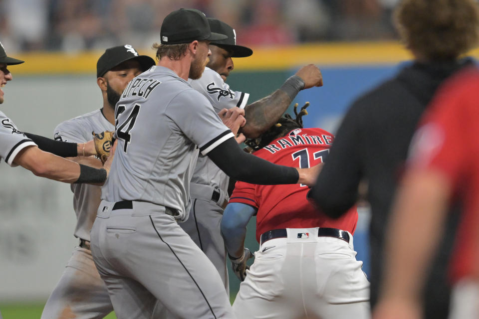 Aug 5, 2023; Cleveland, Ohio, USA; Chicago White Sox shortstop Tim Anderson (7) fights Cleveland Guardians third baseman Jose Ramirez (11) during the sixth inning at Progressive Field. Mandatory Credit: Ken Blaze-USA TODAY Sports