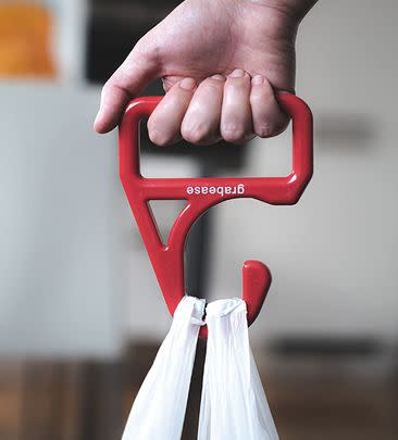 This bag holder is handy for unloading the car after a food shop