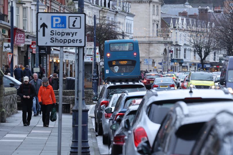 Shoppers out on Mostyn Street in Llandudno