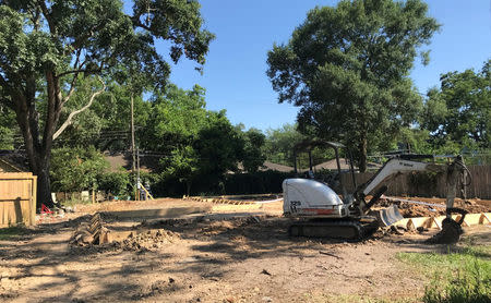 A new home being constructed six feet above the ground to replace the one destroyed by Hurricane Harvey in 2017 is shown in the Meyerland neighborhood of Houston, Texas, May 16, 2018. Photo taken May 16, 2018. REUTERS/Ernest Scheyder