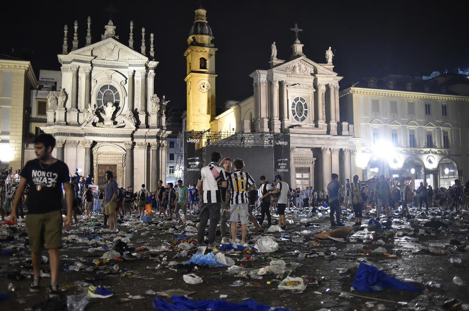 <p>San Carlo Square is seen as Juventus’ fan run away following panic created by the explosion of firecrackers as they was watching the match on a giant screen on June 3, 2017. (Giorgio Perottino/Reuters) </p>