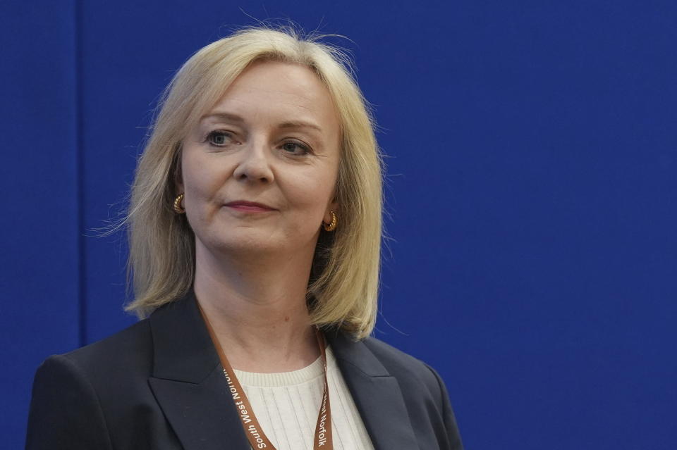 Former prime minister Liz Truss looks on as she loses her Norfolk South West seat to Labour at Alive Lynnsport in King's Lynn, Norfolk, during the count in the 2024 General Election, Friday July 5, 2024. Britain’s Labour Party swept to power Friday after more than a decade in opposition, as a jaded electorate handed the party a landslide victory — but also a mammoth task of reinvigorating a stagnant economy and dispirited nation. (Jacob King/PA via AP)