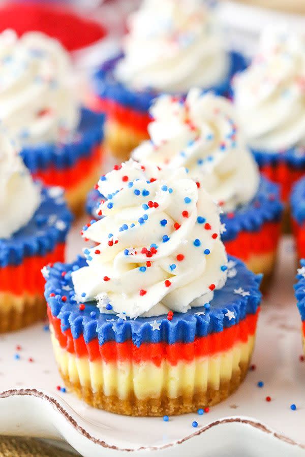 <p>If there's one thing better than cupcakes, it's cheesecake in delicious, bite-sized cupcake form. </p><p><em><a href="https://www.lifeloveandsugar.com/red-white-and-blue-mini-cheesecakes/" rel="nofollow noopener" target="_blank" data-ylk="slk:Get the recipe from Life, Love, and Sugar »;elm:context_link;itc:0;sec:content-canvas" class="link ">Get the recipe from Life, Love, and Sugar »</a></em> </p><p><strong>RELATED: </strong><a href="https://www.goodhousekeeping.com/holidays/g1748/red-white-blue-july-fourth-desserts/" rel="nofollow noopener" target="_blank" data-ylk="slk:36 4th of July Desserts To Celebrate in the Sweetest Possible Way;elm:context_link;itc:0;sec:content-canvas" class="link ">36 4th of July Desserts To Celebrate in the Sweetest Possible Way</a></p>