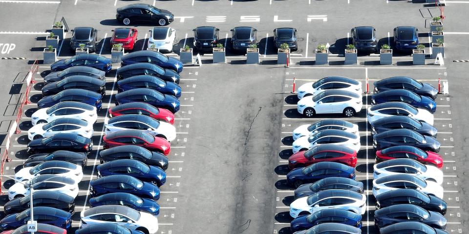 Tesla vehicles in a parking lot