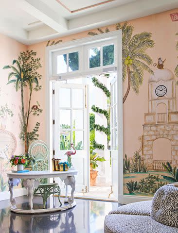 <p>Carmel Brantley; Styling by Page Mullins</p> The Colonyâ€™s official mascot, a monkey named Johnnie Brown, is shown in this wallpaper. He was a former pet of the late Addison Mizner, an architect who greatly influenced the look of Palm Beach.