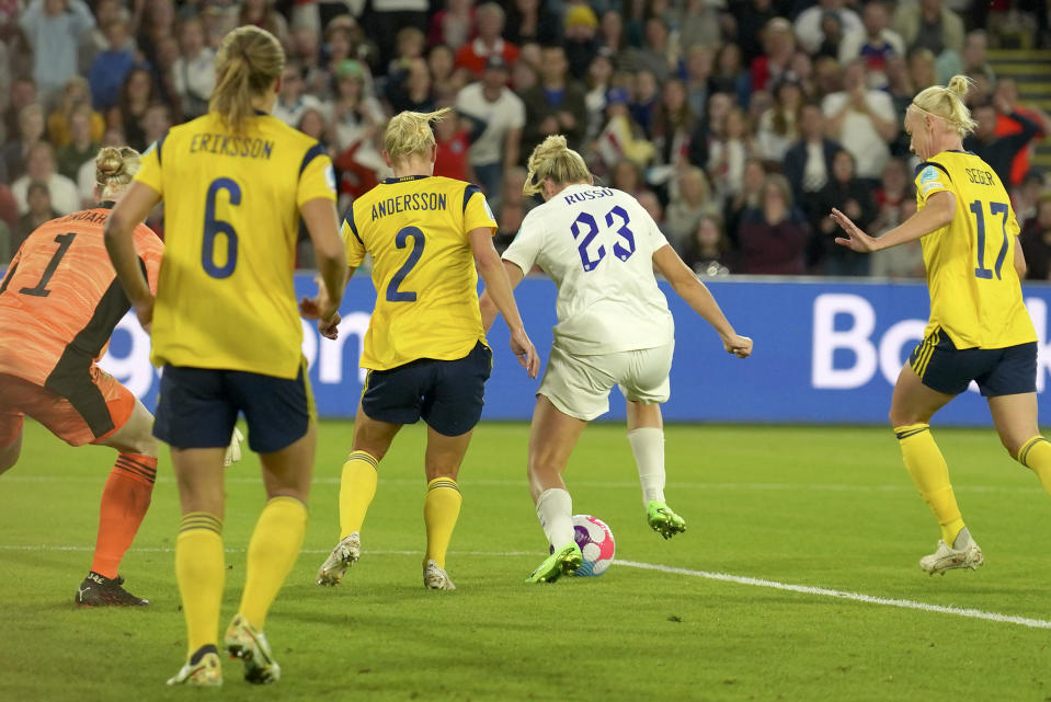 FILE - England's Alessia Russo, second right, scores her side's 3rd goal during the Women Euro 2022 semi final soccer match between England and Sweden at Bramall Lane Stadium in Sheffield, England, Tuesday, July 26, 2022. (AP Photo/Jon Super, File)