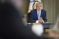 International Olympic Committee (IOC) President Thomas Bach speaks at the opening of the executive board meeting of the IOC in Lausanne, Switzerland, Tuesday, March 28, 2023. The IOC Executive Board is set to discuss the results of consultations regarding the status of athletes from Russia and Belarus in its meeting set to run until March 30. (Laurent Gillieron/Keystone via AP)