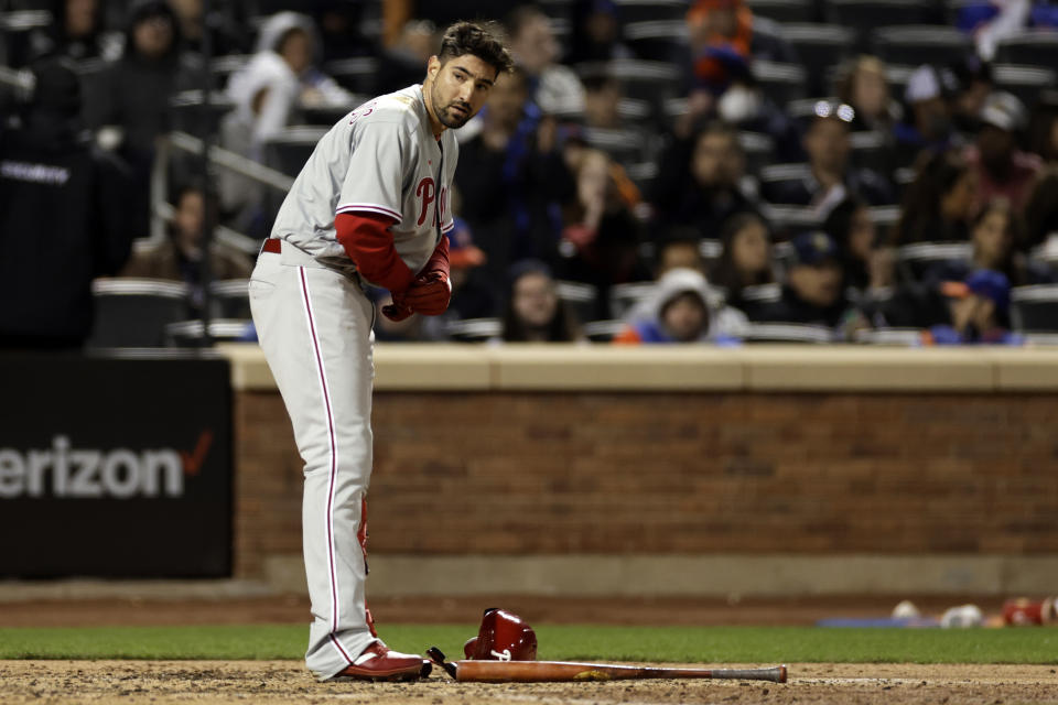 Philadelphia Phillies' Nick Castellanos reacts after striking out during the sixth inning of the team's baseball game against the New York Mets on Friday, April 29, 2022, in New York. (AP Photo/Adam Hunger)
