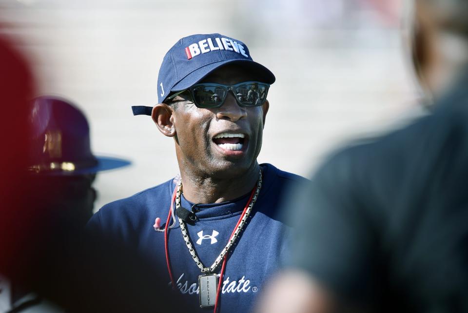 Jackson State head coach Deion Sanders walks out on the field for JSU's spring game at Veterans Memorial Stadium on Sunday, April 24, 2022, in Jackson, Miss.