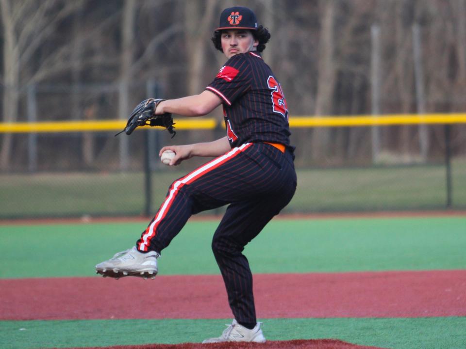 Taunton's Jack Cali tosses a pitch during Monday's Hockomock League game against Sharon.