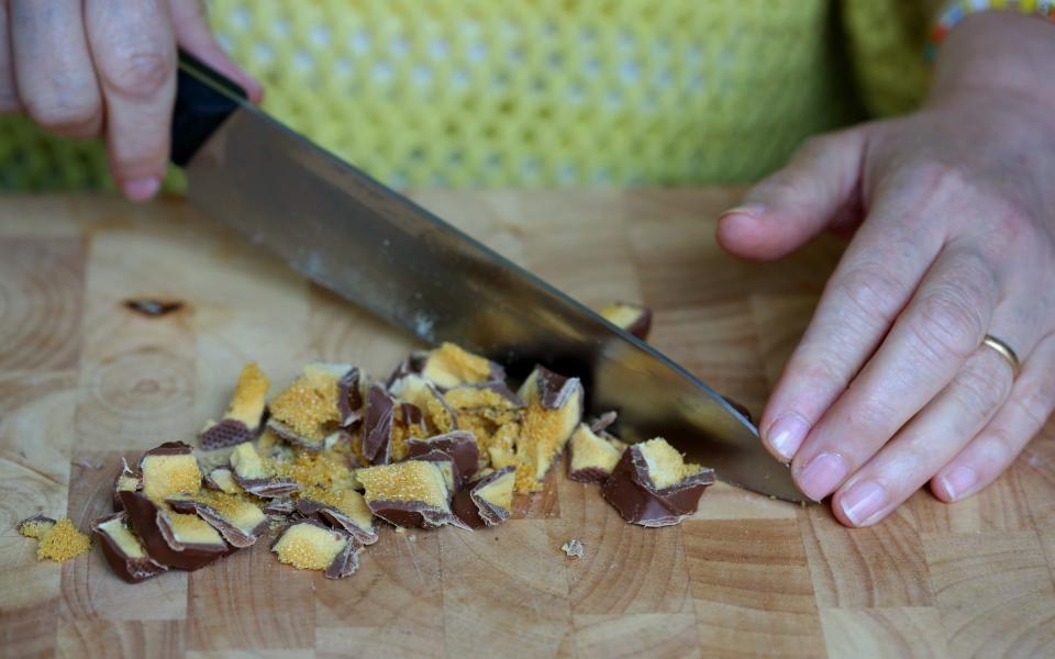 Smash the chocolate honeycomb to finish off the tart