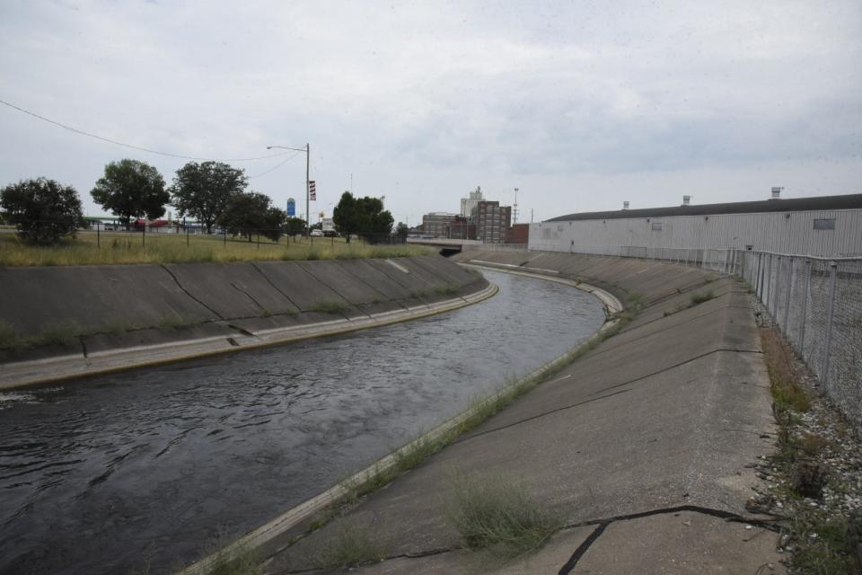 A concrete channel of the Kalamazoo River is pictured in downtown Battle Creek, Mich. on Friday, July 1, 2022.