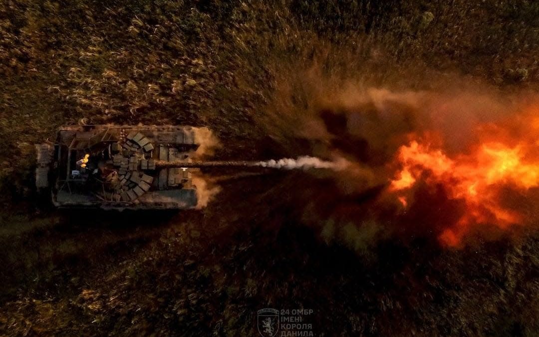 An aerial shot of a tank firing