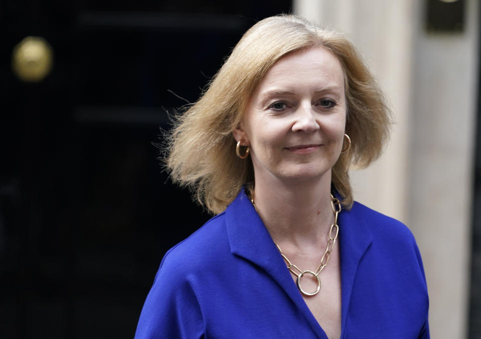 Britain's new Foreign Secretary Liz Truss leaves 10 Downing Street, in London, Wednesday, Sept. 15, 2021. Liz Truss replaced Dominic Raab as foreign secretary in a cabinet reshuffle by British Prime Minister Boris Johnson on Wednesday. (AP Photo/Alberto Pezzali)