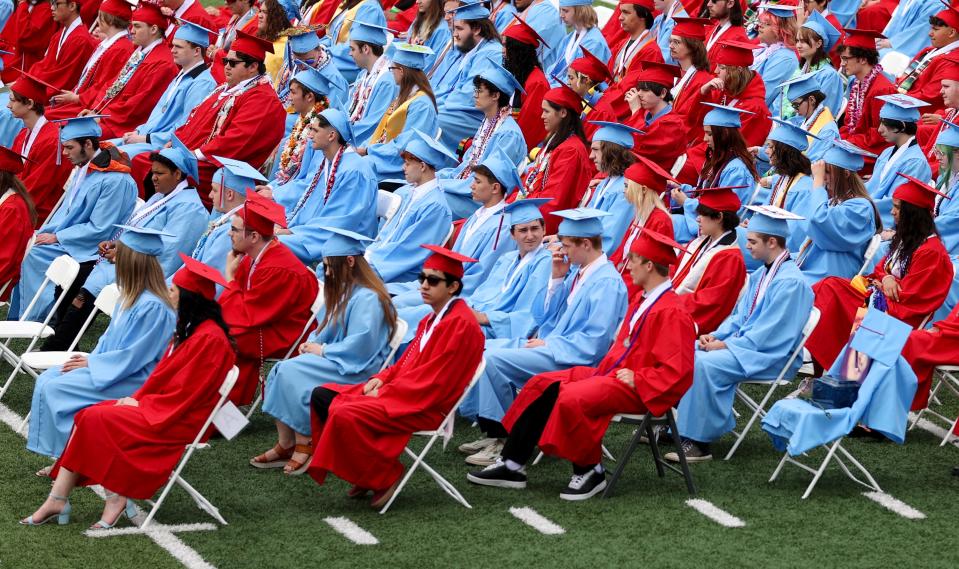 Graduates take their seats during the South Salem High School graduation ceremony June 9.