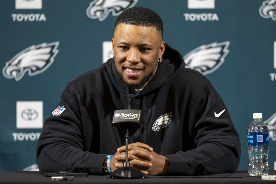 Philadelphia Eagle's Saquon Barkley talks to the media during a press conference after signing with the NFL football team, Thursday, March 14, 2024, in Philadelphia. (AP Photo/Chris Szagola)