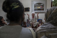 Nadira Haji, a transgender Kashmiri guru, speaks during a special meet of their community members in Srinagar, Indian controlled Kashmir, Thursday, June 3, 2021. Life has not been easy for many of Kashmir's transgender people. Most are ostracized by families and bullied in society. They face domestic abuse and end up running away from families at an early age. Some lack housing, education and other basic resources. (AP Photo/ Dar Yasin)