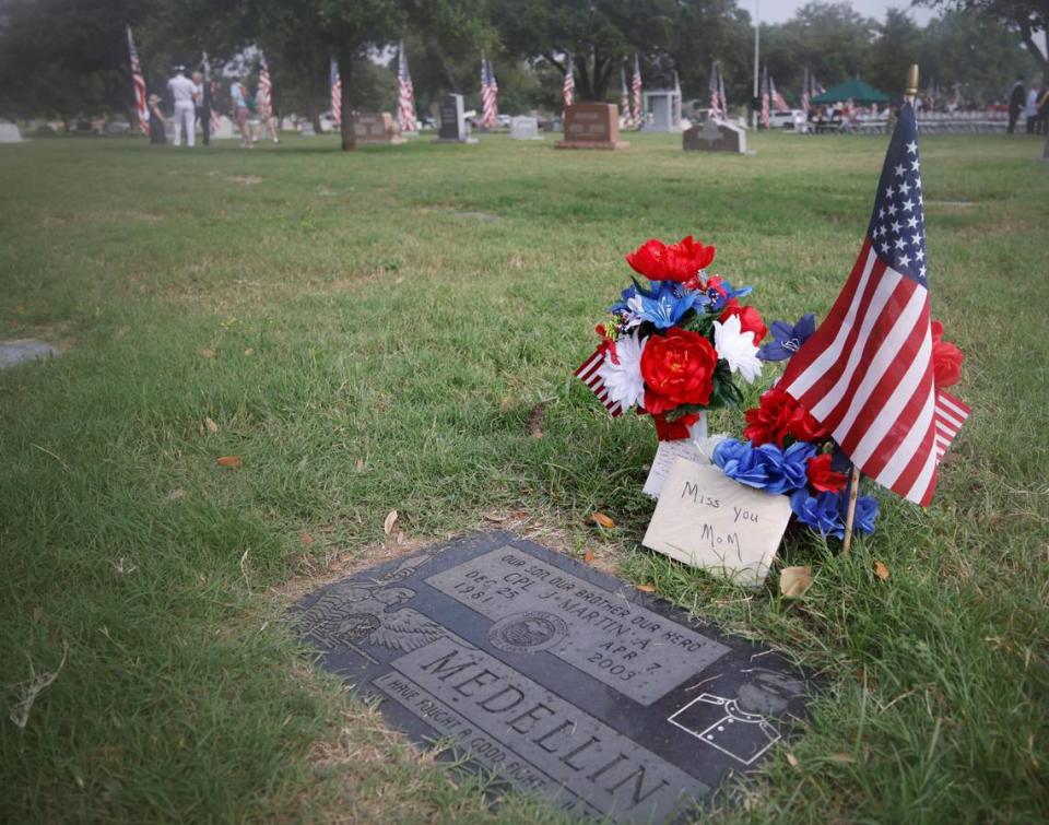 Flags were placed at grave sites around Mount Olivet Cemetery in observance of Memorial Day in Fort Worth, Texas, Monday May 27, 2024. A flyover, prominent city speakers and veterans from every branch attended the event. (Special to the Star-Telegram/Bob Booth)