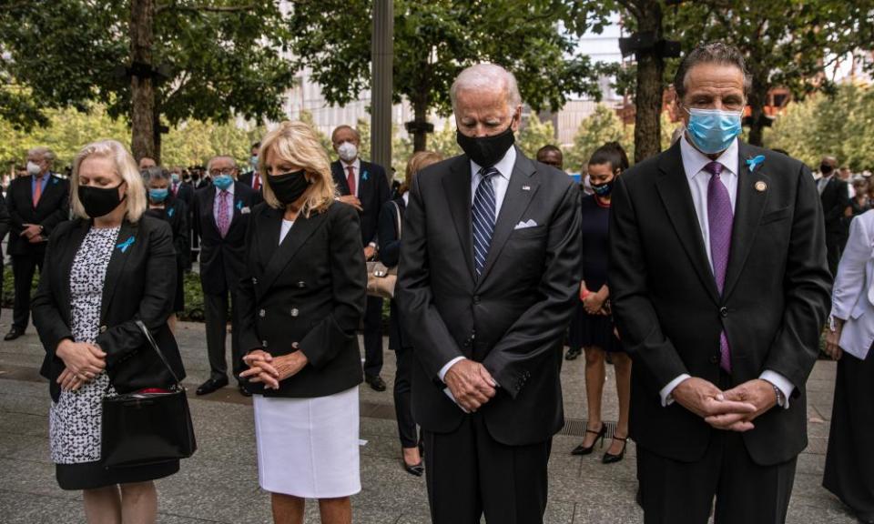 Joe and Jill Biden attend the 9/11 service with Governor Andrew Cuomo, right, at the National September 11 memorial and museum in New York City.