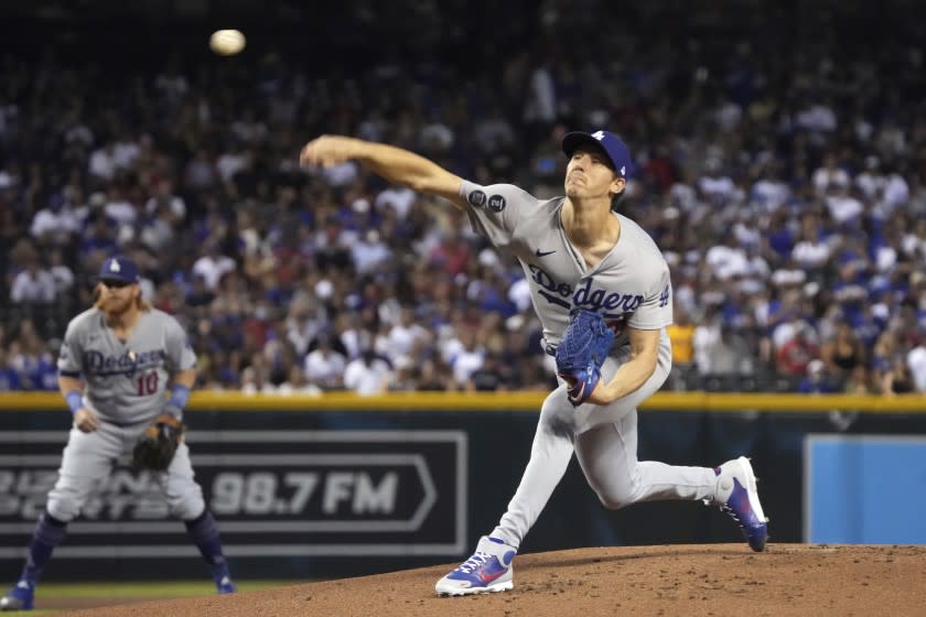 Los Angeles Dodgers pitcher Walker Buehler throws against the Arizona Diamondbacks.