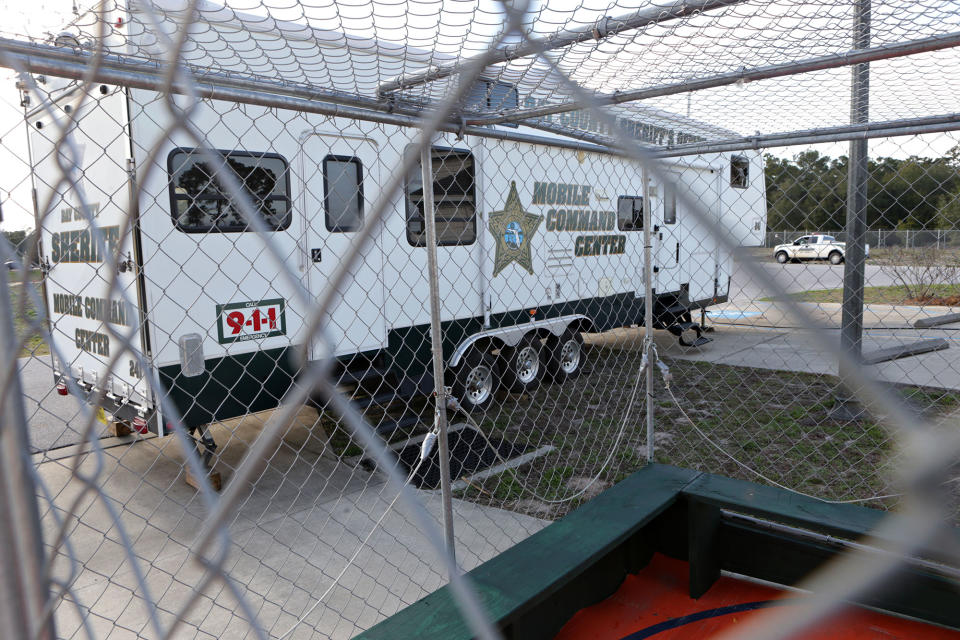 FILE - This March 5, 2014 file photo shows the Bay County Sheriff's Office Mobile Command Center through one of several containment units in Panama City Beach, Fla., a popular travel location for spring break revelers. (AP Photo/The News Herald/Panama City, Fla., Heather Leiphart)