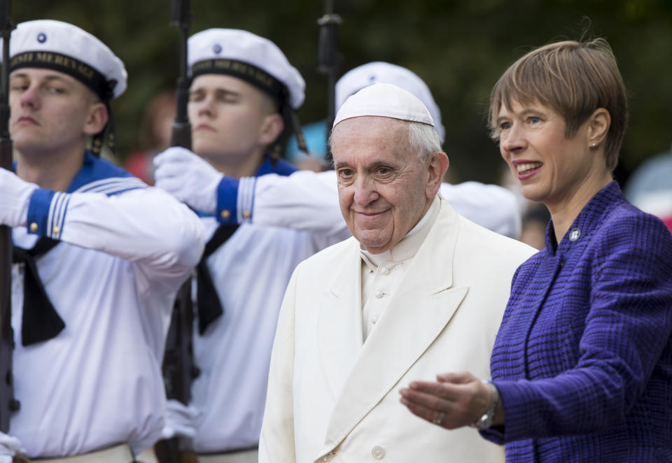 President of Estonia Kersti Kaljulaid, right, welcomes Pope Francis as he arrives at the Kadriorg Presidential Palace in Tallinn, Estonia, Tuesday, Sept. 25, 2018. Pope Francis concludes his four-day tour of the Baltics visiting Estonia. (AP Photo/Mindaugas Kulbis)