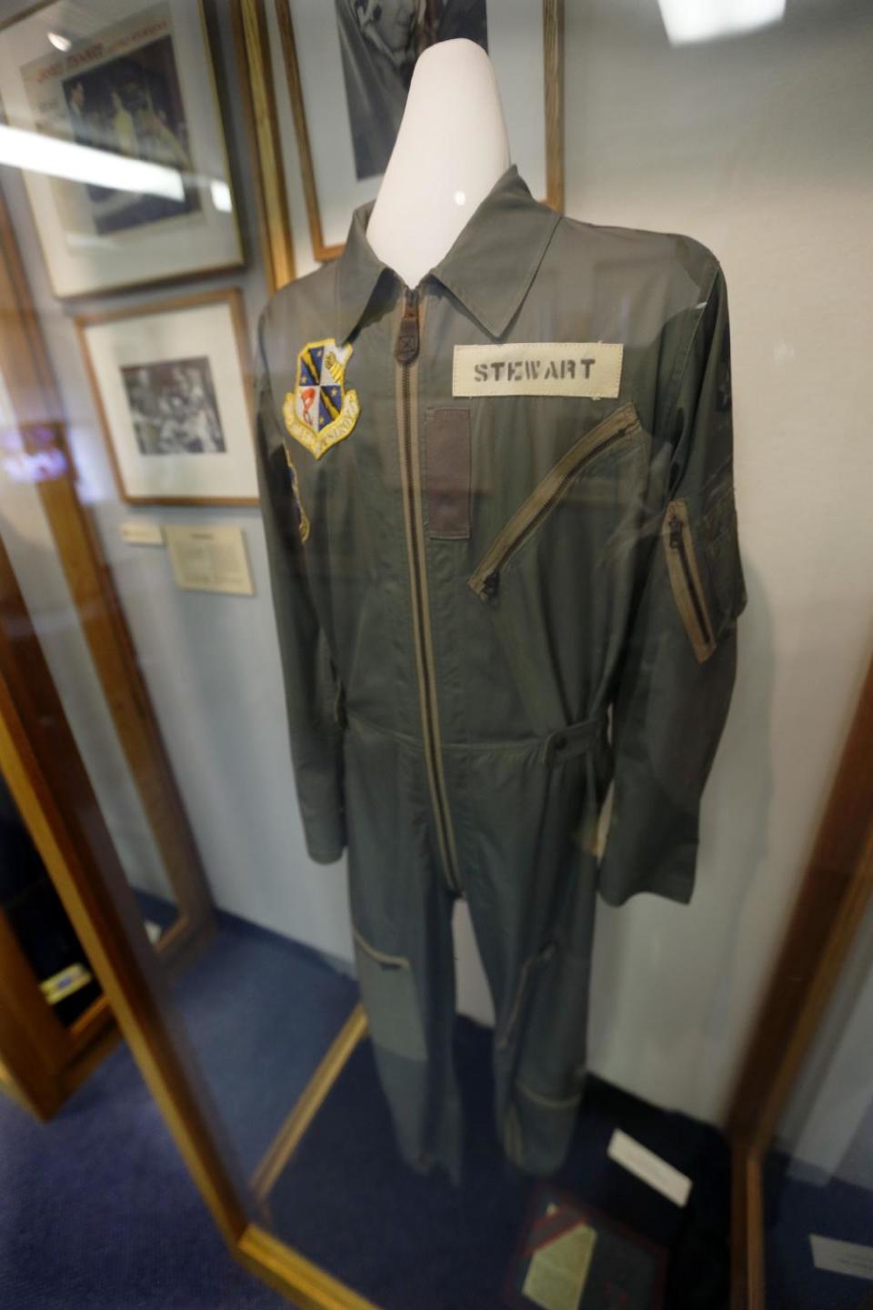 In this photo made on Friday, Dec. 20, 2013, a flight suit that Hollywood legend Jimmy Stewart wore as a member of the Air Force Reserve is on display at the Jimmy Stewart Museum in indiana, Pa. The museum dedicated to the life of the star of many films including the holiday favorite "It's A Wonderful Life" is located in the off-the-beaten track town where Stewart grew up. The museum still attracts visitors from all over the country. It’s full of displays not just about Hollywood, but about Stewart’s service as a bomber pilot in World War II, his well-to-do ancestors, and his family life. (AP Photo/Keith Srakocic)