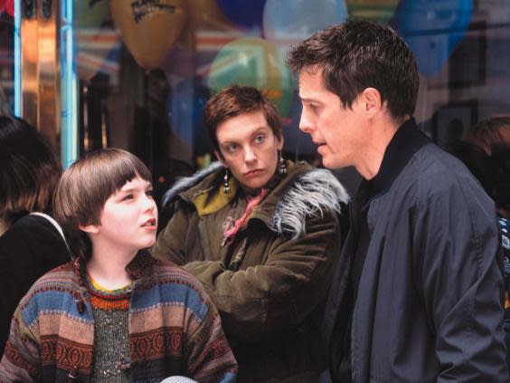Nicholas Hoult, Hugh Grant and Toni Collette in About a Boy (Universal)
