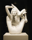 <p>The British artist created a solid gold sculpture of Moss entitled “Siren” for the “Statuephilia” show at the British Museum in 2008. The piece weighed over 100lbs and showed Moss engaged in a pretzel-like yoga pose. “This sculpture is not of Kate Moss the person, it’s of Kate Moss the cultural hallucination,” said Quinn at the time.</p><p><i>Photo: Getty Images</i></p>