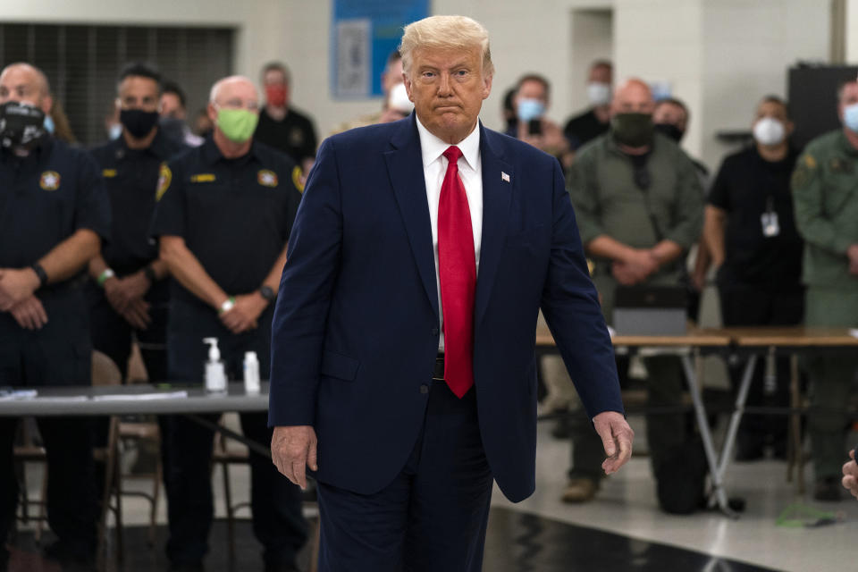 President Donald Trump tours an emergency operations center and meets with law enforcement officers at Mary D. Bradford High School, Tuesday, Sept. 1, 2020, in Kenosha, Wis. (AP Photo/Evan Vucci)