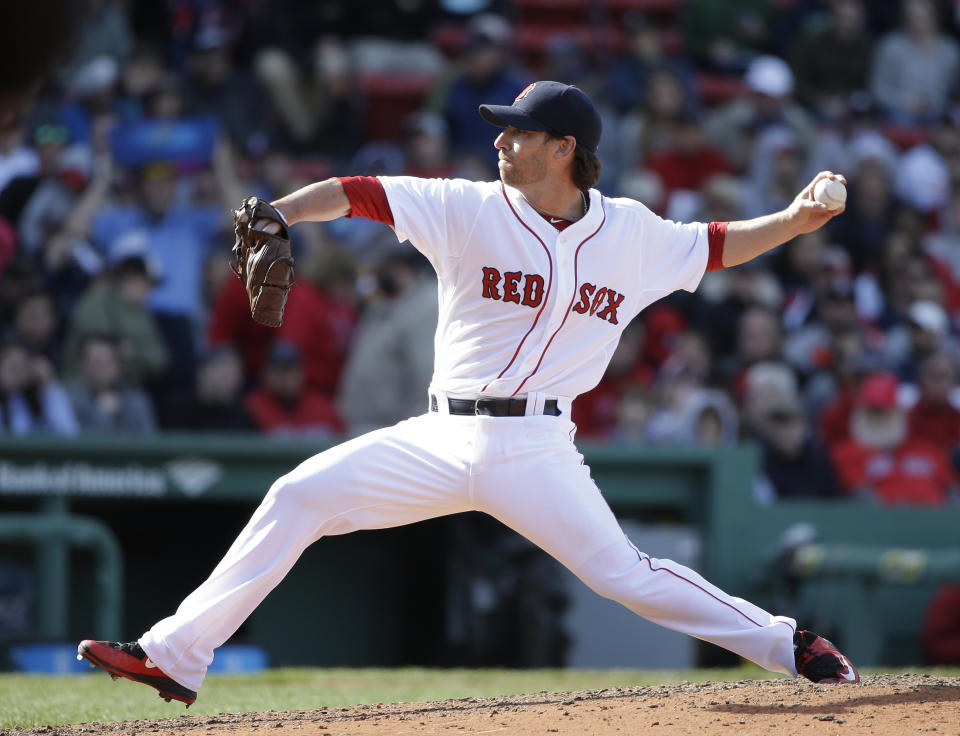 FILE - Boston Red Sox relief pitcher Craig Breslow winds up for a pitch during the seventh inning of a baseball game against the Baltimore Orioles, in Boston, April 19, 2015. The Boston Red Sox have hired ex-pitcher Craig Breslow to run their baseball operations department, a team official said Wednesday, Oct. 25, 2023. (AP Photo/Steven Senne, File)