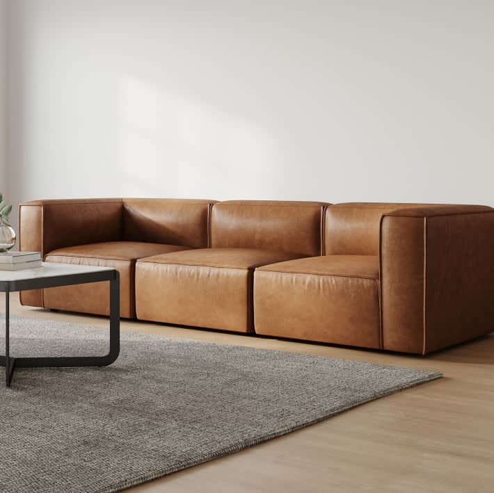 <p><a href="https://go.redirectingat.com?id=74968X1596630&url=https%3A%2F%2Fwww.westelm.com%2Fproducts%2Fremi-leather-3-piece-sofa-h6241&sref=https%3A%2F%2Fwww.elledecor.com%2Fshopping%2Ffurniture%2Fg61975065%2Fbest-modular-sofas%2F" data-i13n="elm:affiliate_link;elmt:premonetized" rel="sponsored" target="_blank" data-ylk="slk:Shop Now;elm:affiliate_link;elmt:premonetized;itc:0;sec:content-canvas" class="link rapid-noclick-resp rapid-with-clickid etailiffa-link">Shop Now</a></p> <p>Remi Leather Modular Sofa </p> <p>westelm.com</p> <p>$2078.00</p><span class="copyright">West Elm</span>