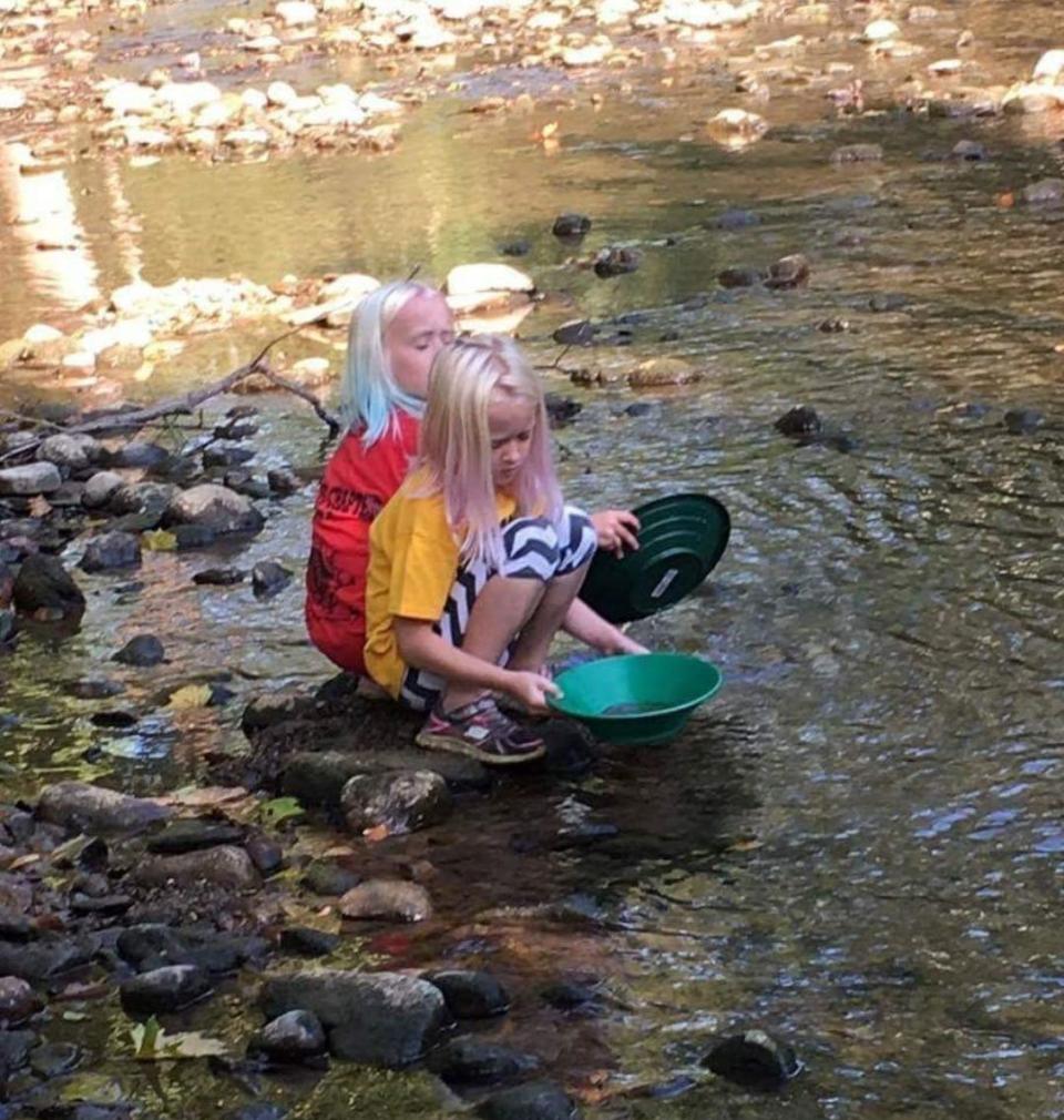 Children pan for gold at the Swank Claim, 1099 Cutnaw Rd. in Bellville.