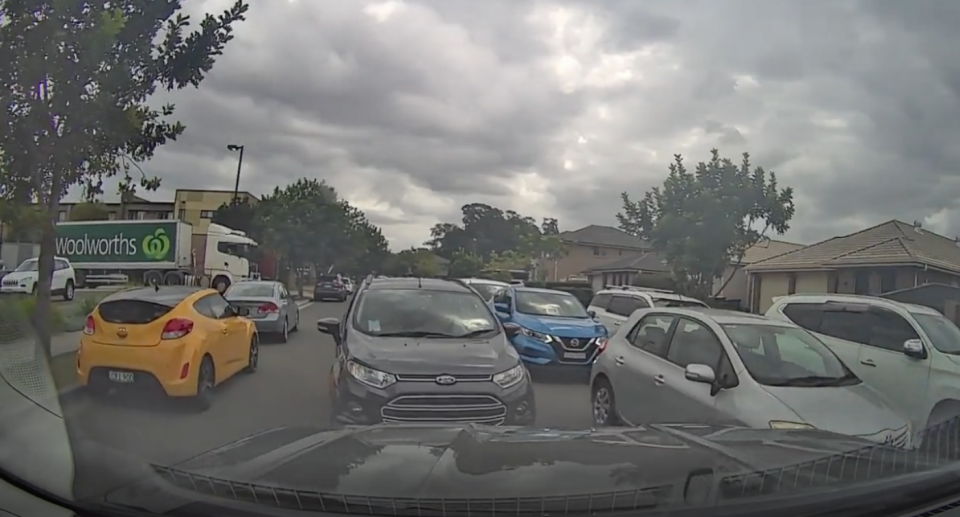 Screenshot from the dashcam footage showing the Ford coming down the wrong way. 