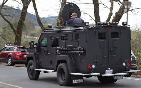 An armored vehicle arrives at the Veterans Home of California in Yountville - Credit: AP