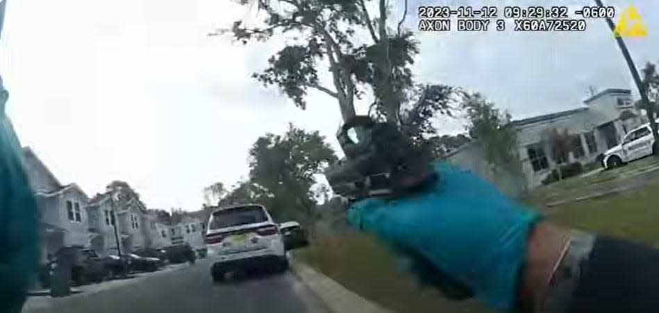 Body camera footage shows an Okaloosa County sheriff's deputy shooting into a patrol car with a suspect inside after thinking he heard a suppressed gunshot. The sound actually came from an acorn falling on the car.