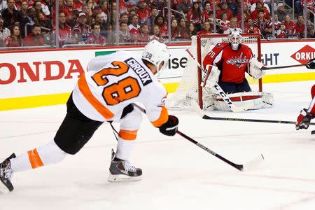 Apr 16, 2016; Washington, DC, USA; Washington Capitals goalie Braden Holtby (70) makes a save on Philadelphia Flyers center Claude Giroux (28) in the second period in game two of the first round of the 2016 Stanley Cup Playoffs at Verizon Center. Mandatory Credit: Geoff Burke-USA TODAY Sports