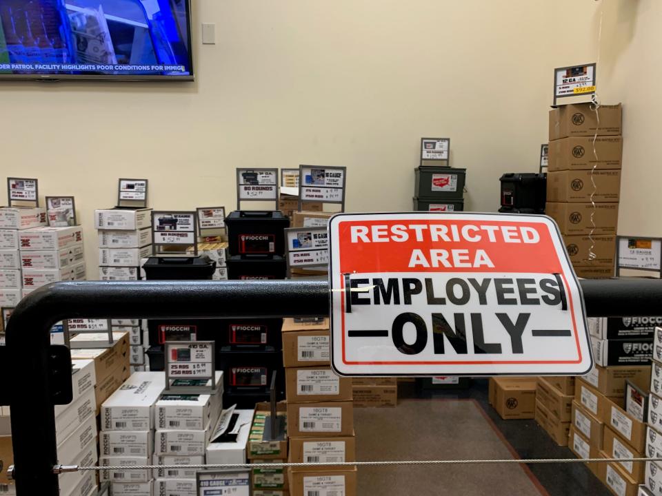 Boxes of ammunition are kept in a restricted area at LAX Ammunition on June 14, 2019. The store is one of several that has experienced a surge in sales ahead of the implementation of a new background check law.