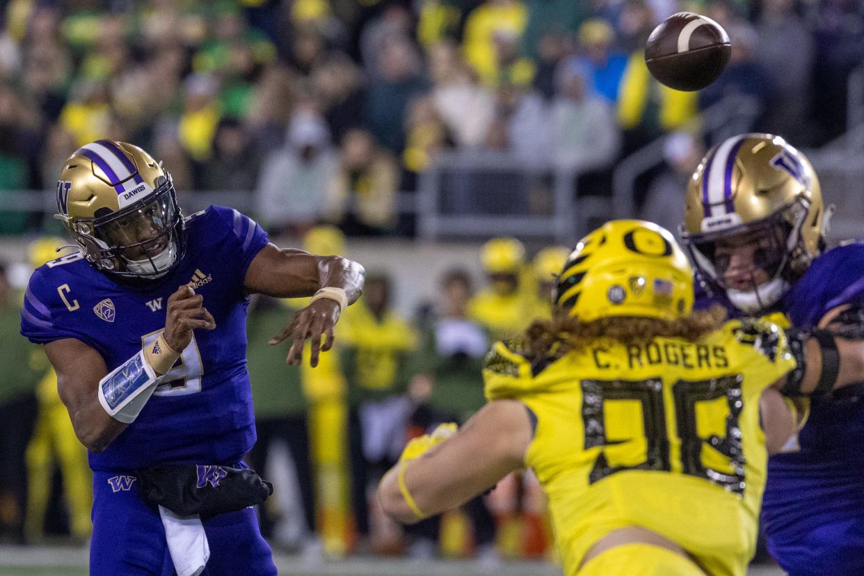 Washington quarterback Michael Penix Jr. passes during a third quarter drive against Oregon at Autzen Stadium in Eugene, Ore., on Saturday, Nov. 12, 2022.