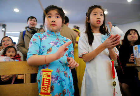 Vietnamese who live in Japan celebrate Vietnamese New Year at a Catholic Church in Kawaguchi, near Tokyo, Japan February 10, 2019. REUTERS/Issei Kato