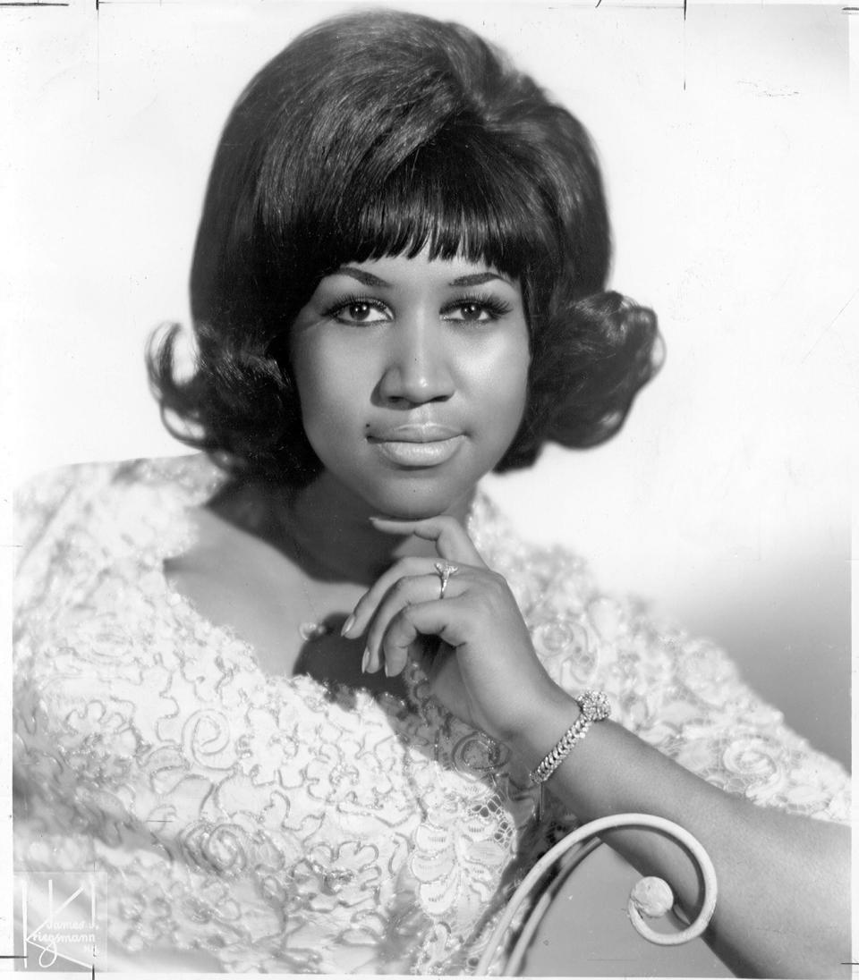 A posed portrait of Aretha Franklin, wearing an engagement ring, in 1963.