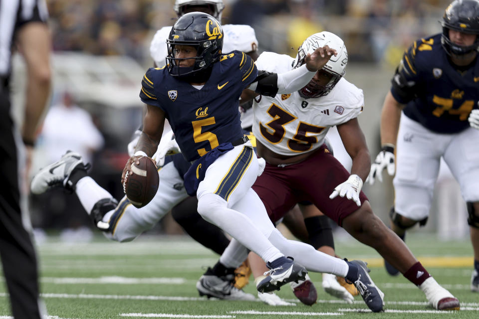 California quarterback Sam Jackson V (5) runs against Arizona State defensive lineman B.J. Green II (35) during the second half of an NCAA college football game in Berkeley, Calif., Saturday, Sept. 30, 2023. (AP Photo/Jed Jacobsohn)