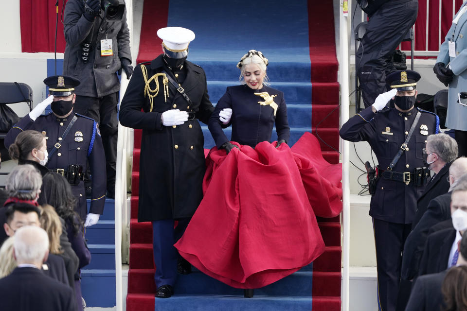 Lady Gaga arrives to sing the National Anthem during the 59th Presidential Inauguration. - Credit: AP