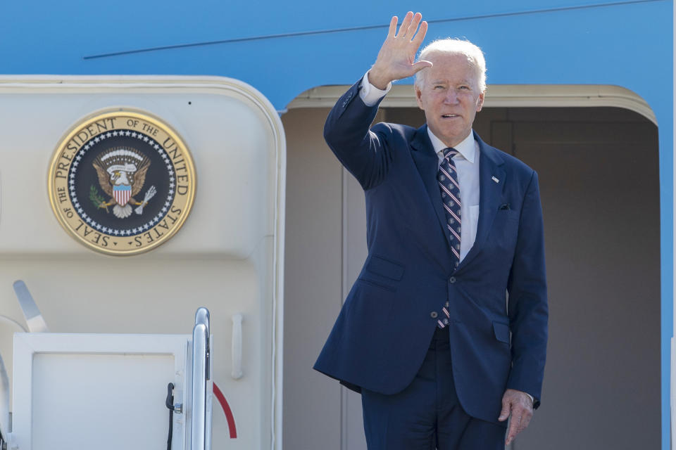 President Biden waves as he boards Air Force One at Andrews Air Force Base, Md., Sept. 9, 2022, on his way to the groundbreaking of the new Intel semiconductor manufacturing facility in New Albany, Ohio. (AP Photo/Gemunu Amarasinghe)
