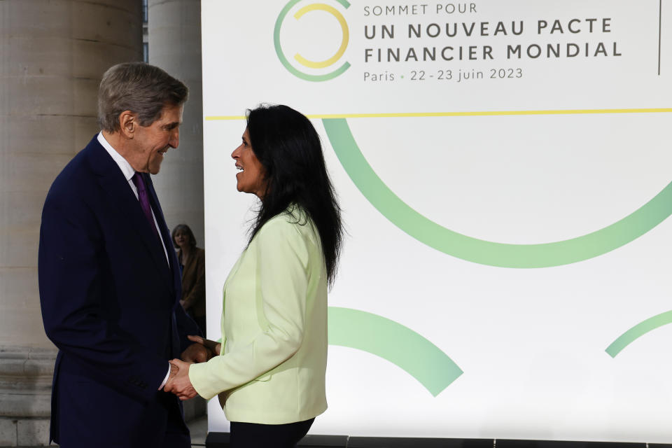 US Climate Envoy John Kerry, left, is welcomed by French Secretary of State for Development, Francophonie and International Partnerships Chrysoula Zacharopoulou at the New Global Financial summit in Paris Thursday, June 22, 2023. World leaders, heads of international organizations and activists are gathering in Paris for a two-day summit aimed at seeking better responses to tackle poverty and climate change issues by reshaping the global financial system. (Ludovic Marin, Pool via AP)