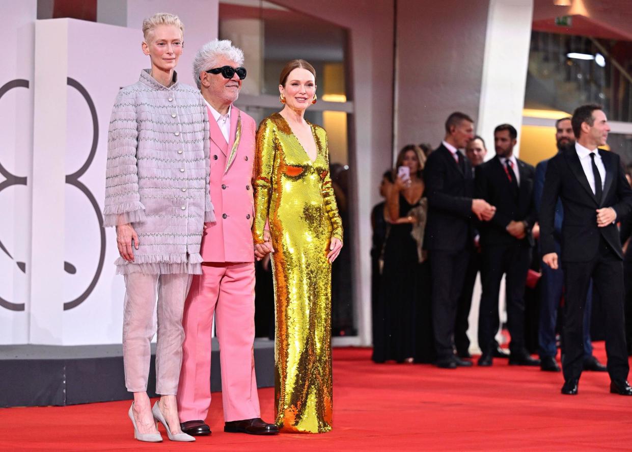 <span>Tilda Swinton, left, and Julianne Moore, right, with director Pedro Almodóvar at the Venice premiere of his film The Room Next Door.</span><span>Photograph: Earl Gibson III/Rex/Shutterstock</span>